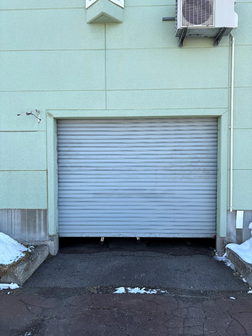 手動シャッター交換修理（北海道旭川市）｜スプリングシャフト・スラット交換工事｜施工事例