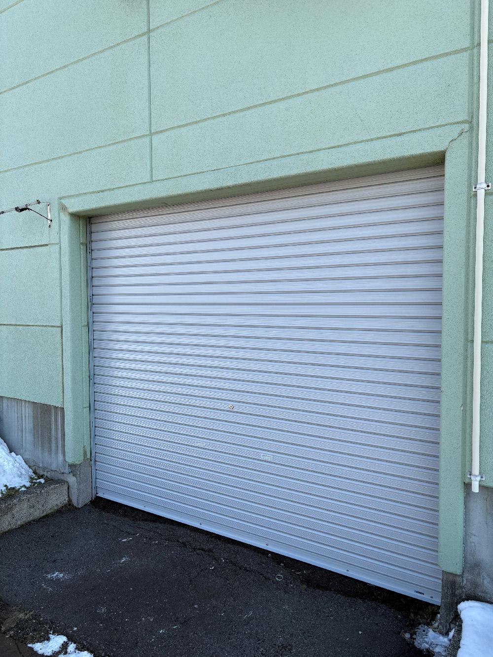 手動シャッター交換修理（北海道旭川市）｜スプリングシャフト・スラット交換工事｜施工事例